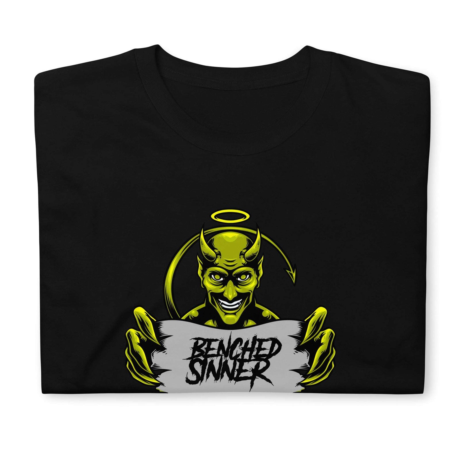 Black short-sleeve unisex Logo Tee featuring a green devil character holding a sign that reads "Benched Sinner"