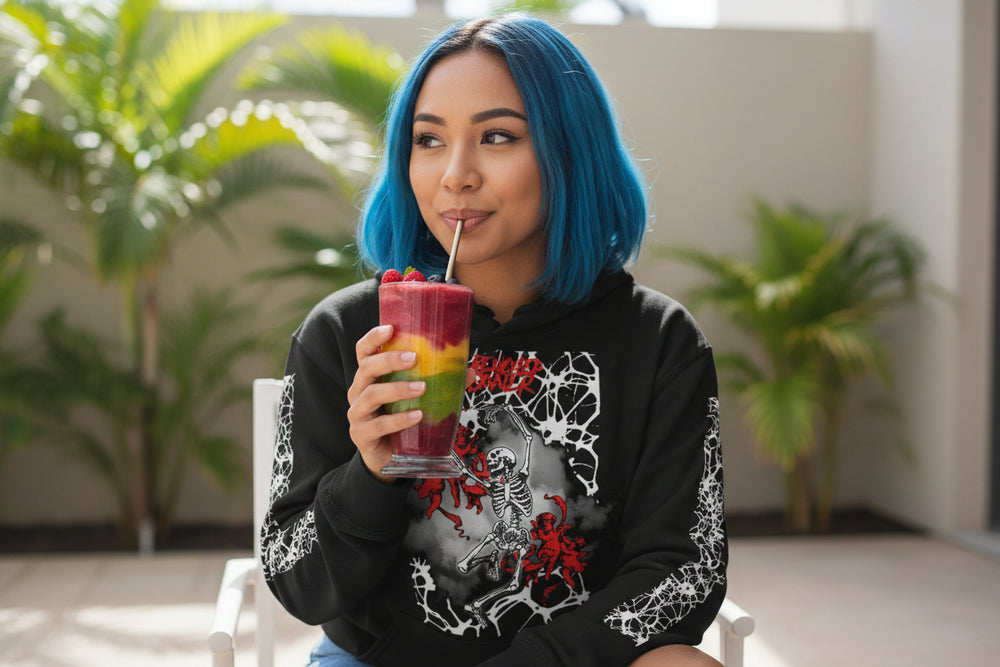 Black Benched Sinner Paradise unisex hoodie with white web patterns on sleeves and red skeleton graphic on front
